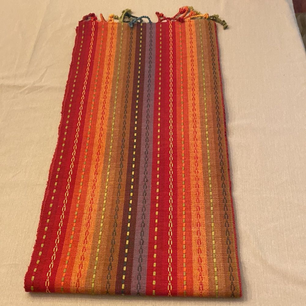Vibrant cotton, woven table runner  Approx 14”W x 100” L